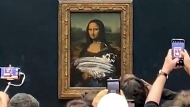 Mona Lisa Tablosunun Pastalı Saldırıya Uğradığı Andan Yeni Görüntüler: ‘Dünyayı Düşünün’ Mesajı Verilmek İstenmiş... [Video]